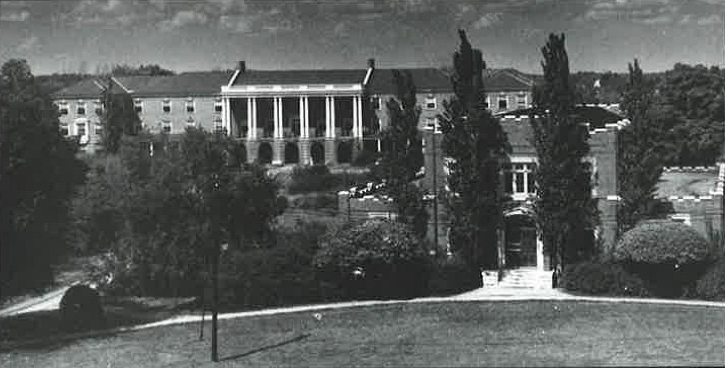 The Commons building, a dining hall for the surrounding student housing, sat in front of the Harned building, 365bet's oldest building.